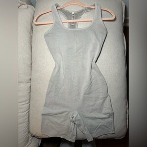 Skims Cotton Jersey Onesie in Stone
